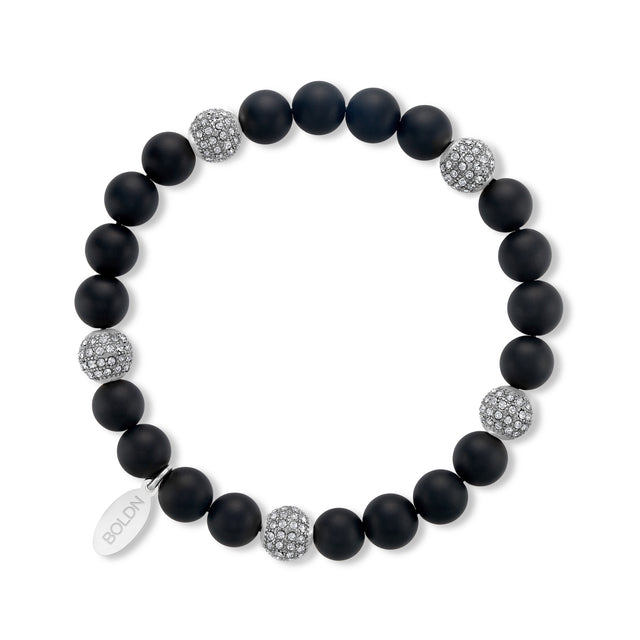 Black beaded bracelet with silver accents on a white background