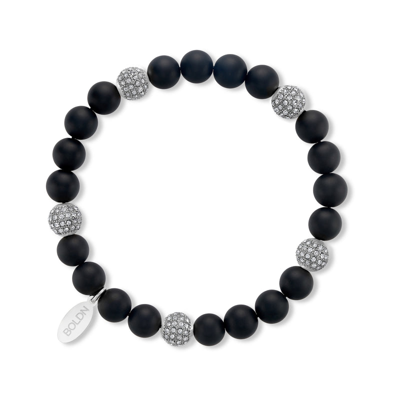 Black beaded bracelet with silver accents on a white background