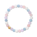 Pastel beaded bracelet with a gold bead on a white background